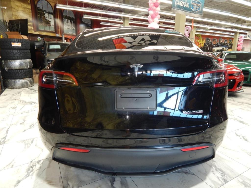 used 2023 Tesla Model Y car, priced at $30,000