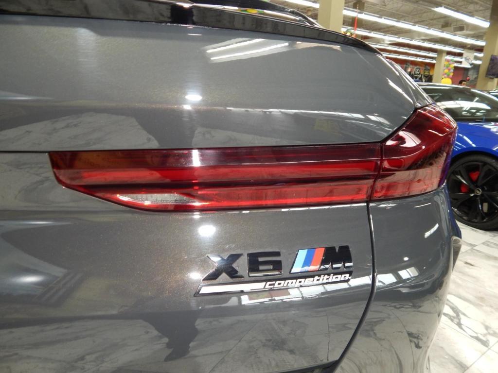 used 2023 BMW X6 M car, priced at $84,995