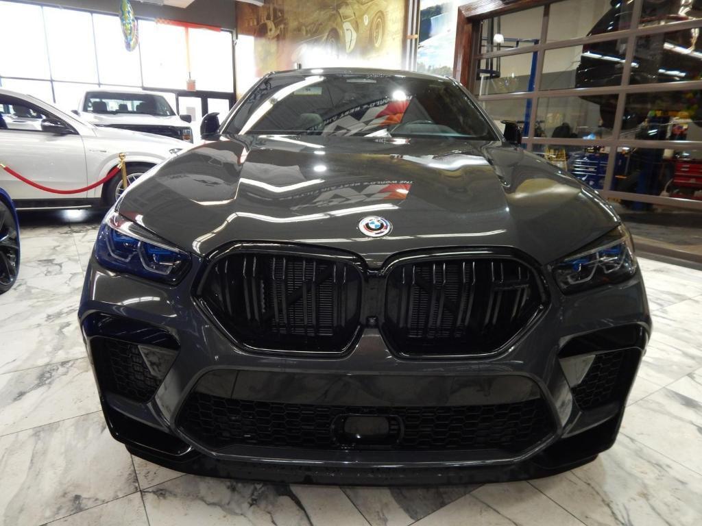 used 2023 BMW X6 M car, priced at $84,995