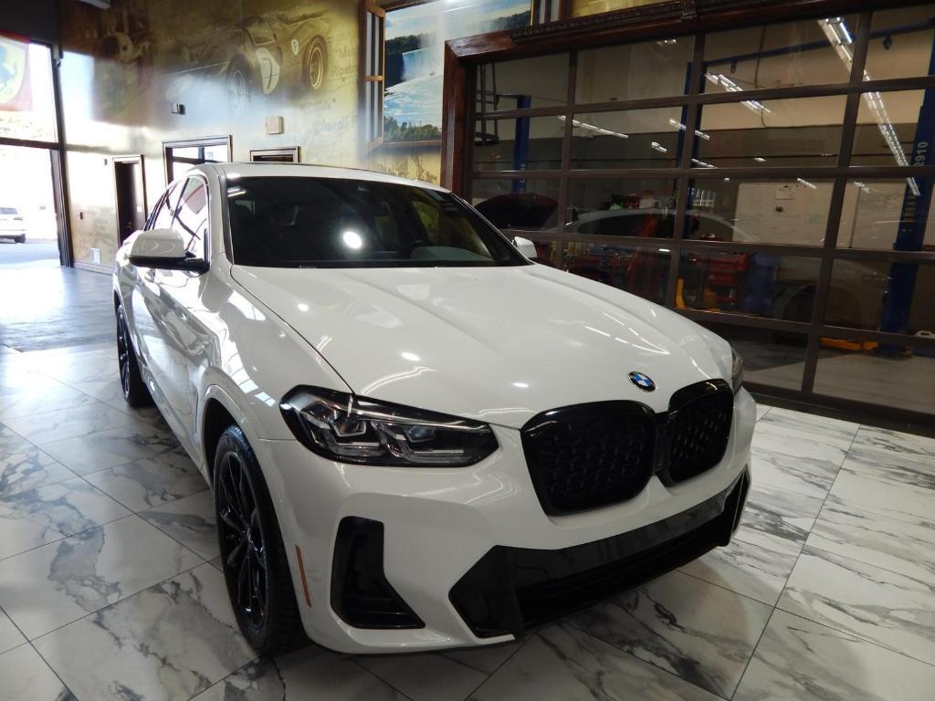 used 2022 BMW X4 car, priced at $34,395