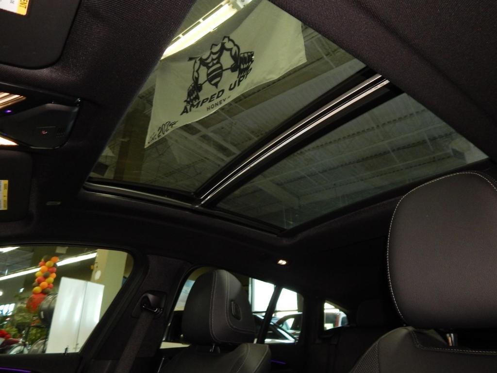 used 2022 BMW X4 car, priced at $34,395