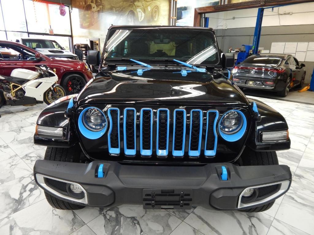 used 2023 Jeep Wrangler 4xe car, priced at $31,878