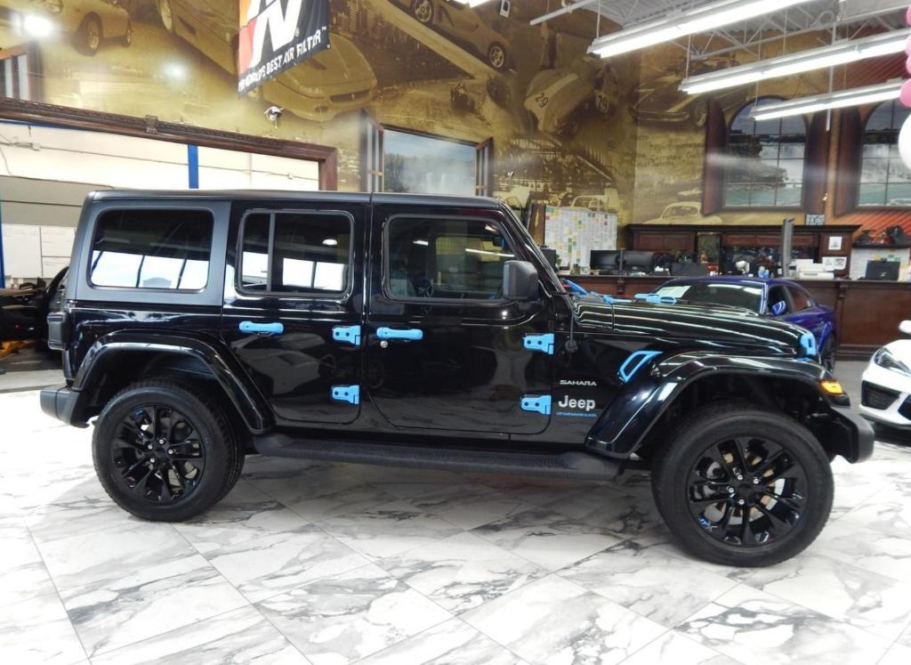 used 2023 Jeep Wrangler 4xe car, priced at $31,878
