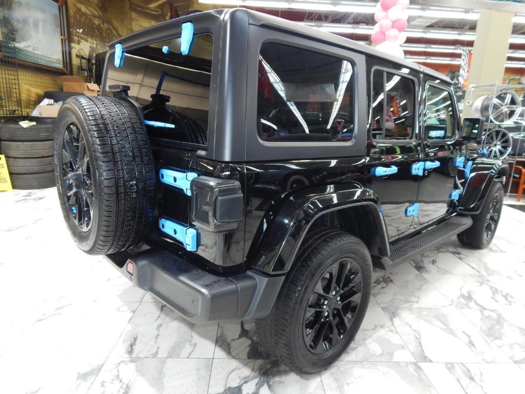 used 2023 Jeep Wrangler 4xe car, priced at $31,878