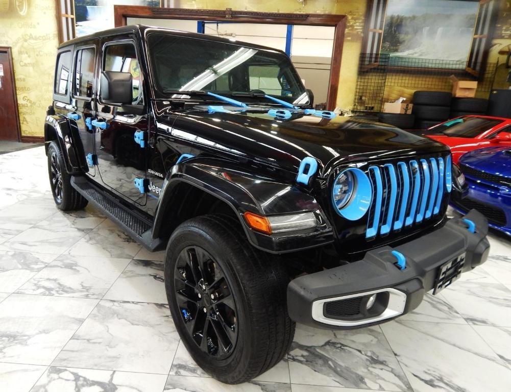 used 2023 Jeep Wrangler 4xe car, priced at $31,878