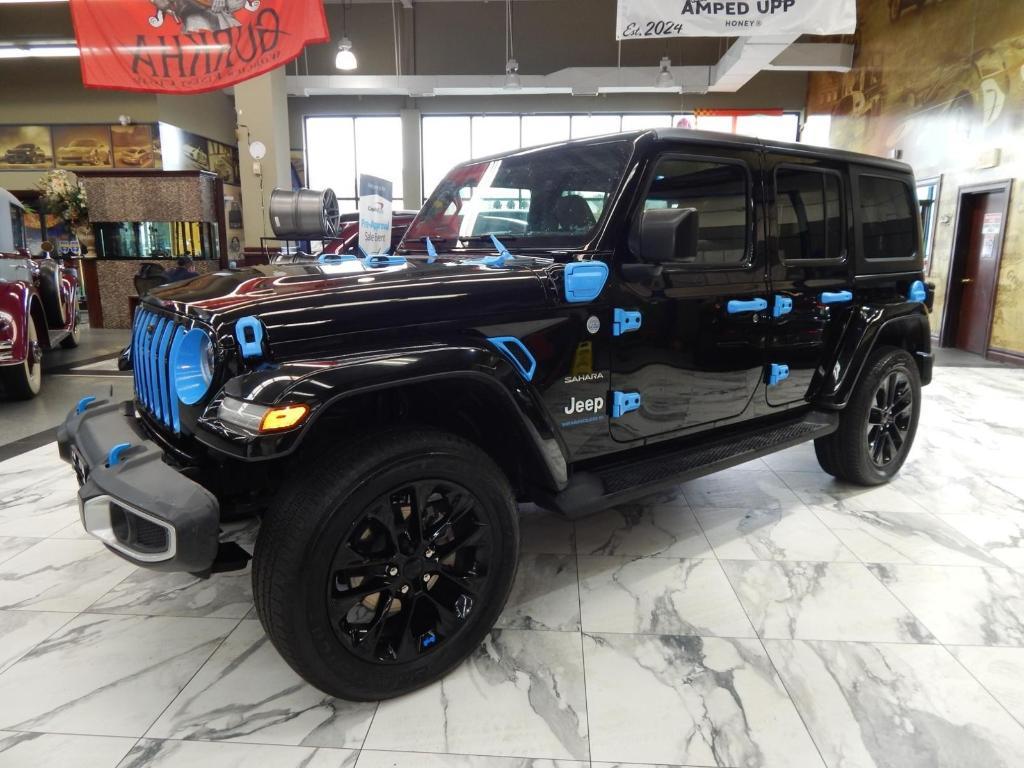 used 2023 Jeep Wrangler 4xe car, priced at $31,878