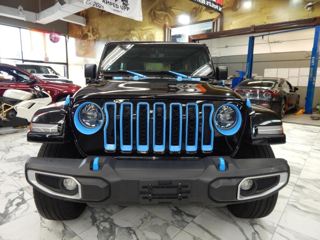used 2023 Jeep Wrangler 4xe car, priced at $31,878