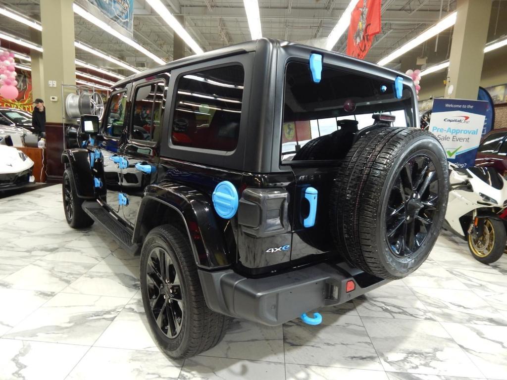 used 2023 Jeep Wrangler 4xe car, priced at $31,878
