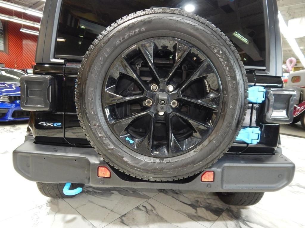 used 2023 Jeep Wrangler 4xe car, priced at $31,878