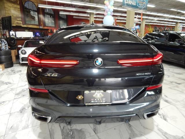 used 2023 BMW X6 car, priced at $50,921