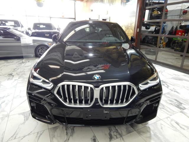 used 2023 BMW X6 car, priced at $50,921