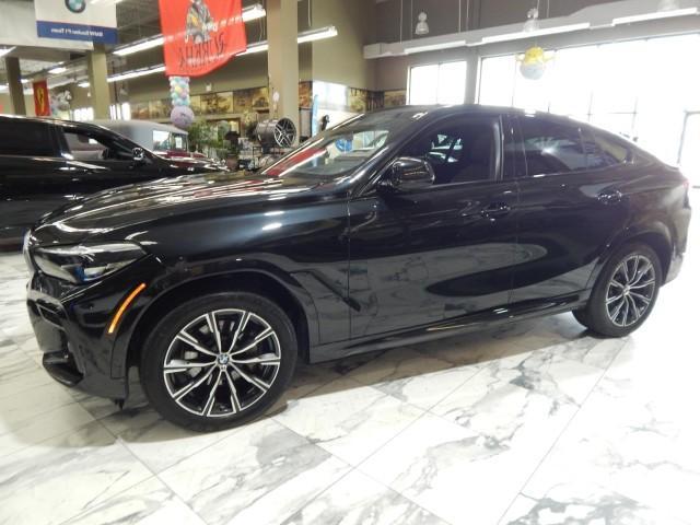 used 2023 BMW X6 car, priced at $50,921