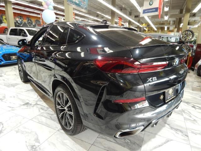 used 2023 BMW X6 car, priced at $50,921