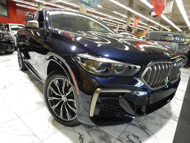 used 2022 BMW X6 car, priced at $59,821