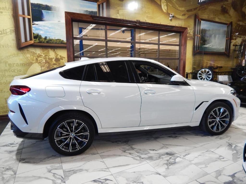 used 2023 BMW X6 car, priced at $48,895