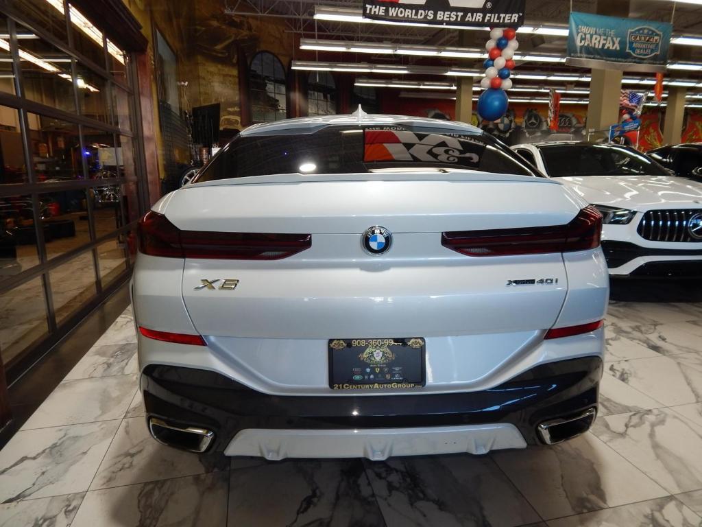 used 2023 BMW X6 car, priced at $48,895