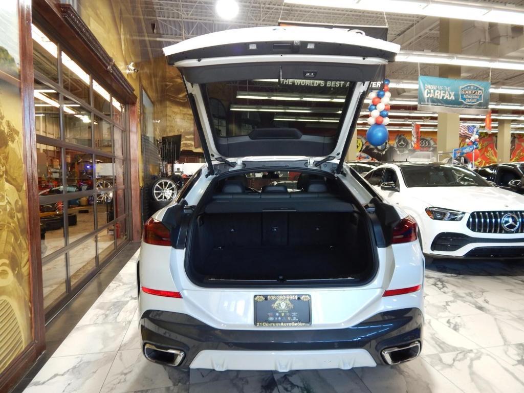 used 2023 BMW X6 car, priced at $48,895