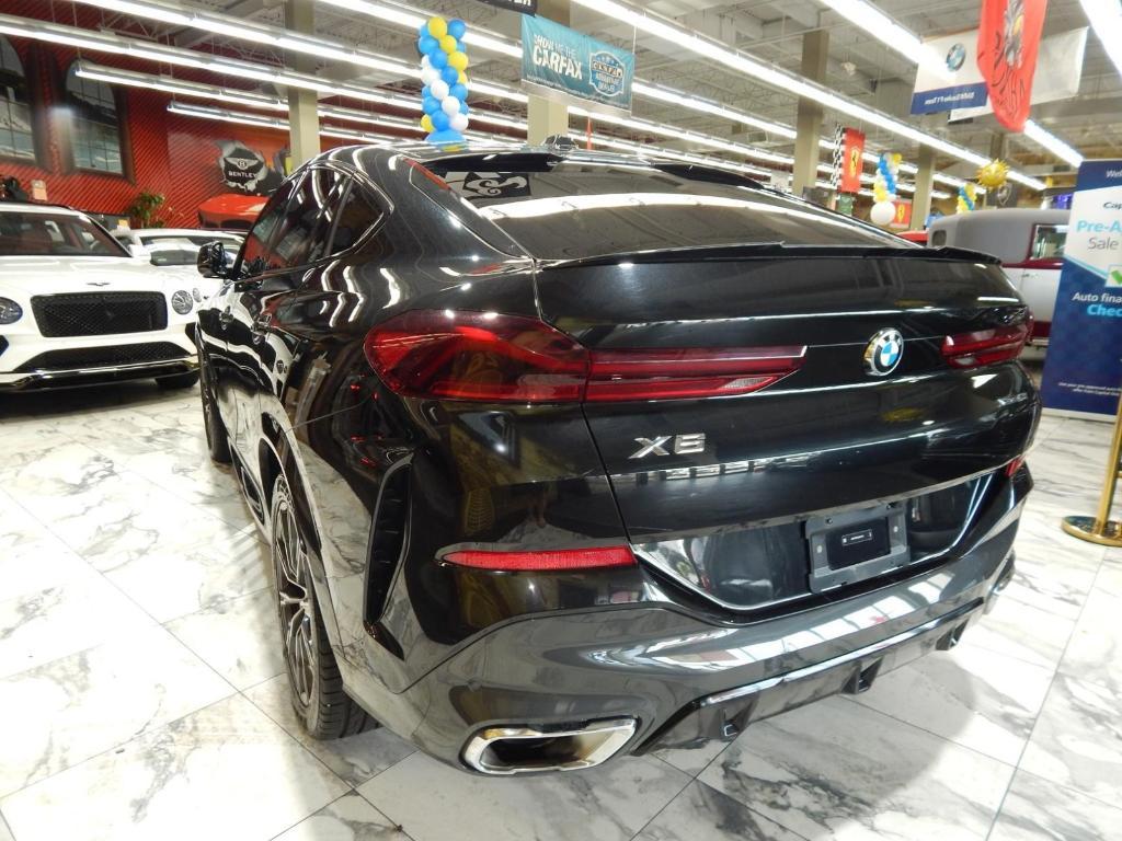 used 2025 BMW X6 car, priced at $52,225
