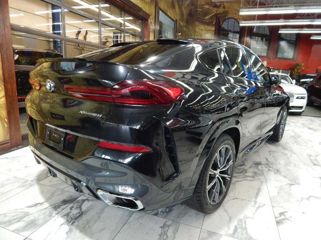used 2025 BMW X6 car, priced at $52,225