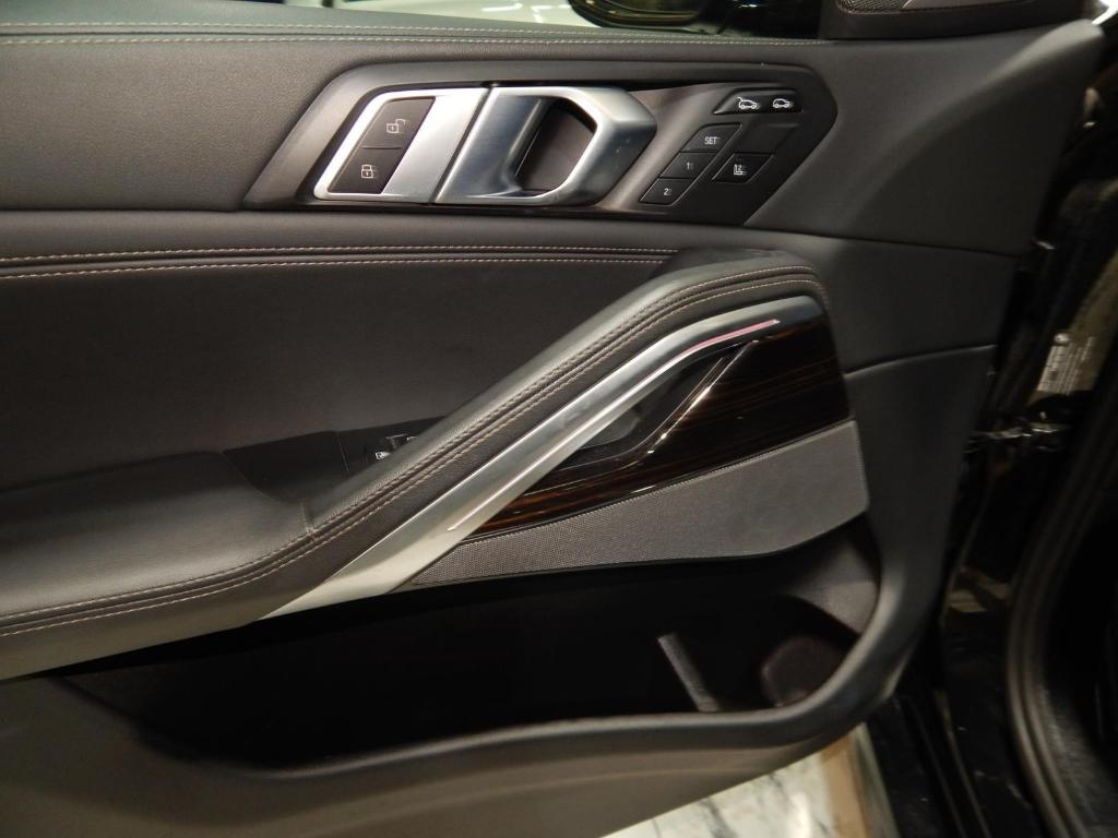 used 2025 BMW X6 car, priced at $52,225