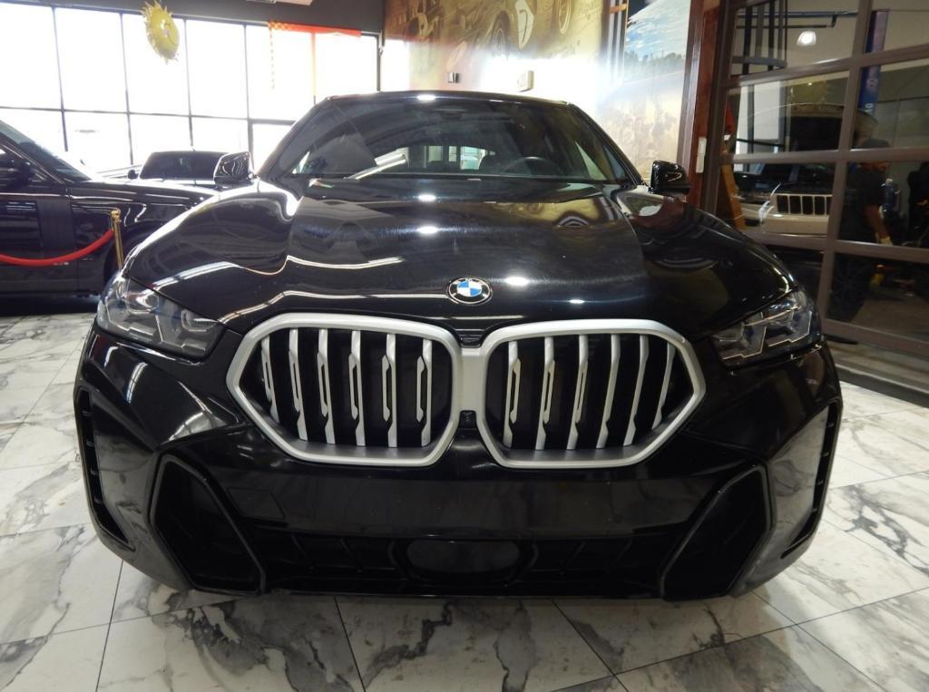 used 2025 BMW X6 car, priced at $52,225