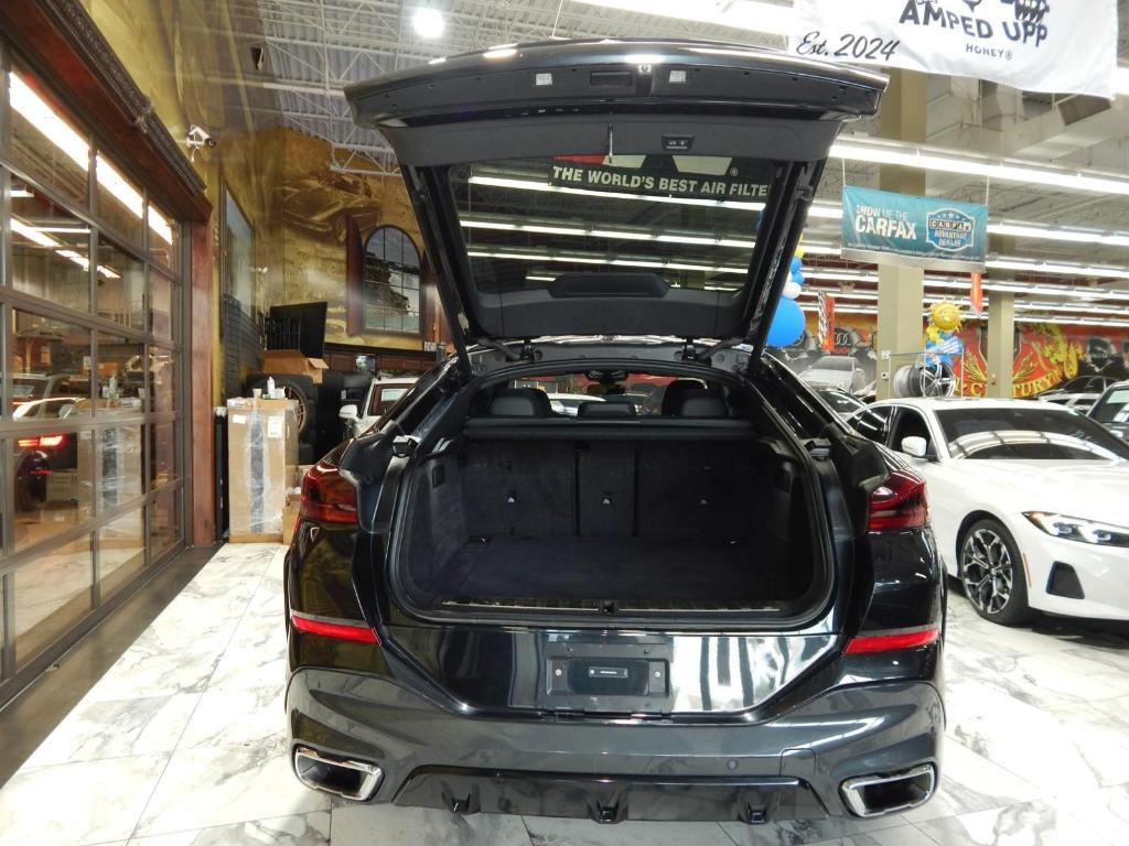used 2025 BMW X6 car, priced at $52,225