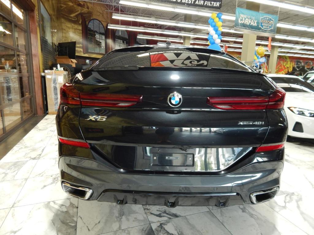 used 2025 BMW X6 car, priced at $52,225