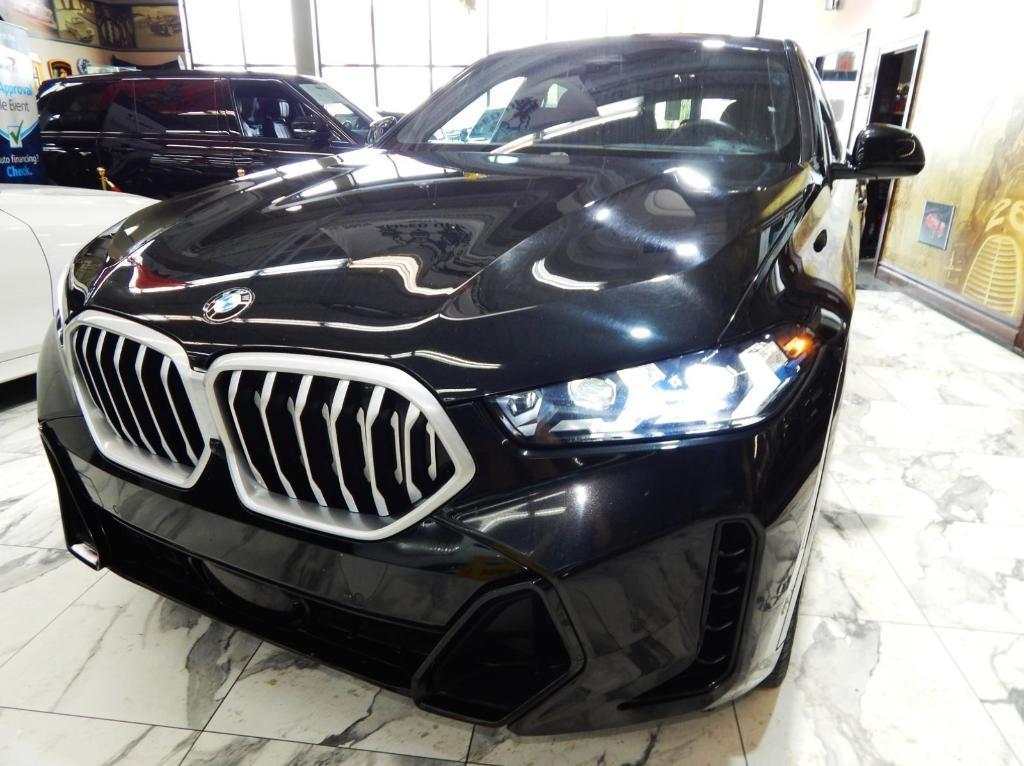 used 2025 BMW X6 car, priced at $52,225