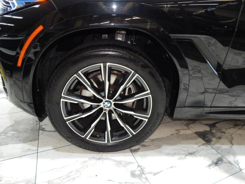used 2025 BMW X6 car, priced at $52,225