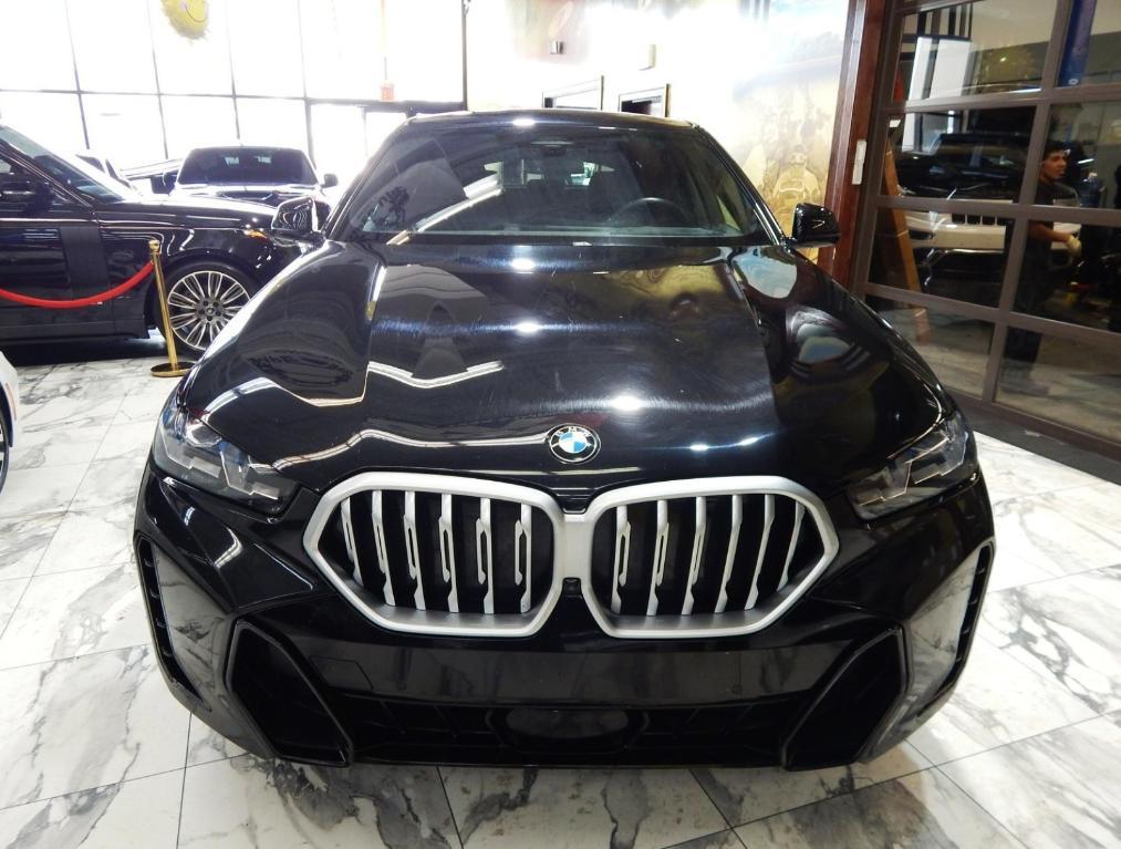 used 2025 BMW X6 car, priced at $52,225