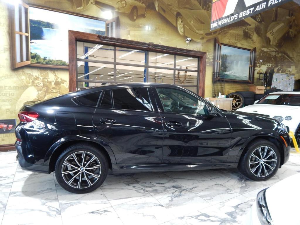 used 2025 BMW X6 car, priced at $52,225