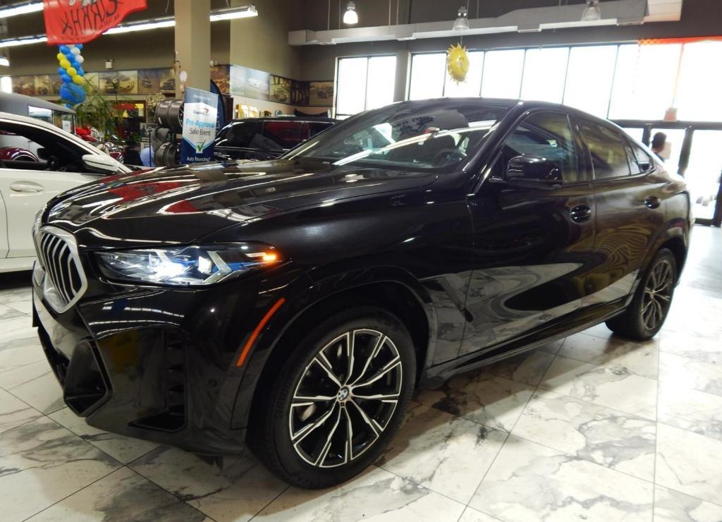 used 2025 BMW X6 car, priced at $52,225