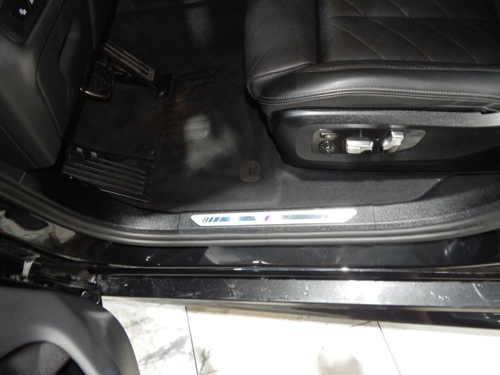 used 2025 BMW X6 car, priced at $52,225