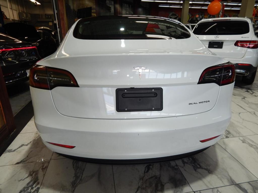 used 2023 Tesla Model 3 car, priced at $26,995