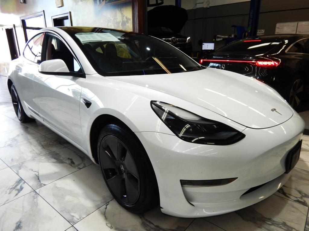used 2023 Tesla Model 3 car, priced at $26,995