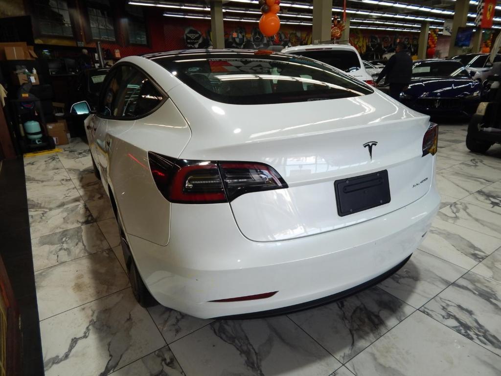 used 2023 Tesla Model 3 car, priced at $26,995