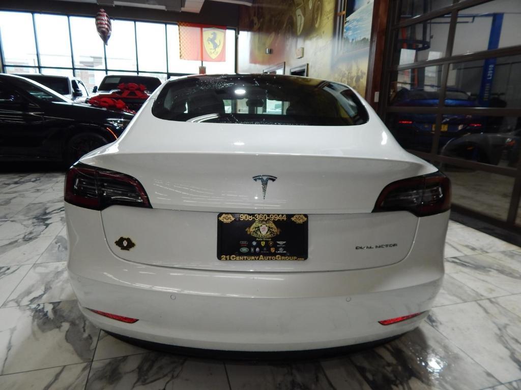 used 2023 Tesla Model 3 car, priced at $22,895