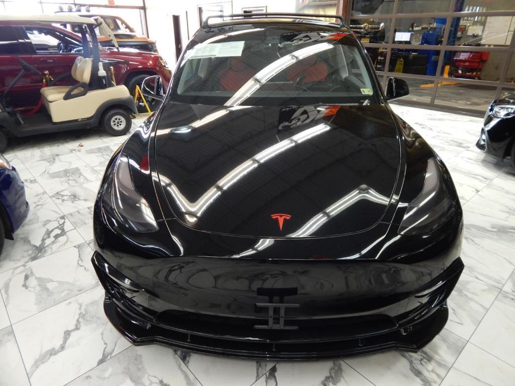 used 2023 Tesla Model Y car, priced at $34,795