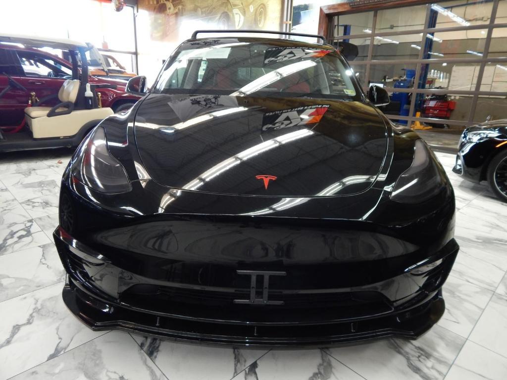 used 2023 Tesla Model Y car, priced at $34,795