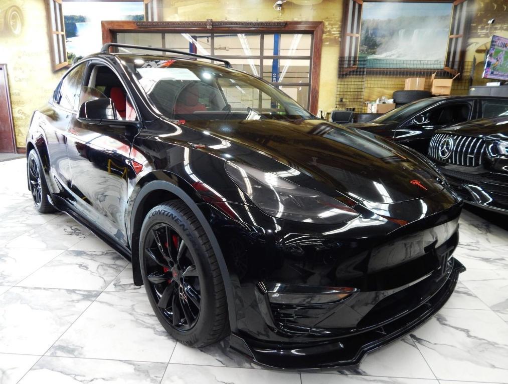 used 2023 Tesla Model Y car, priced at $34,795