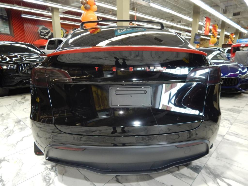 used 2023 Tesla Model Y car, priced at $34,795