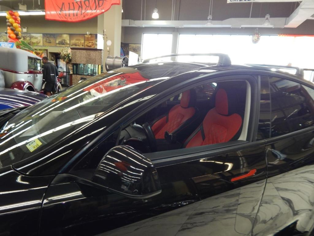 used 2023 Tesla Model Y car, priced at $34,795