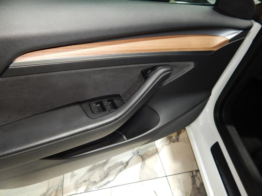 used 2022 Tesla Model 3 car, priced at $27,595