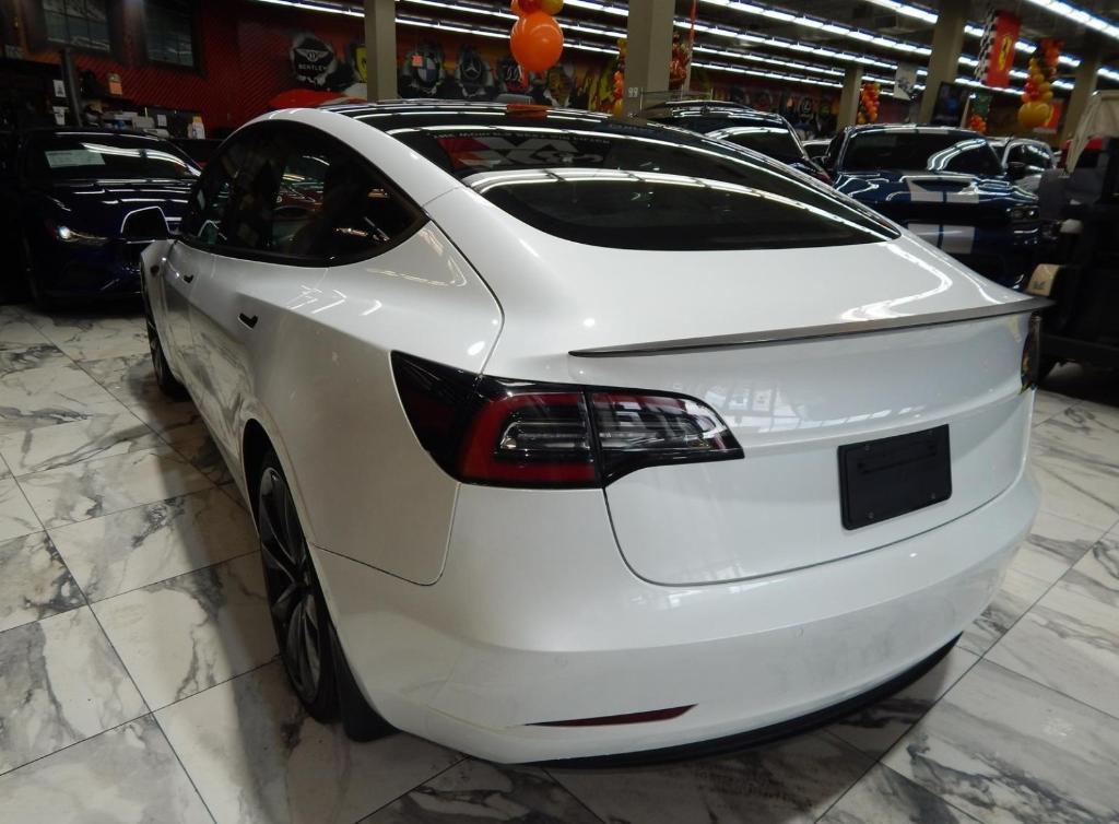 used 2022 Tesla Model 3 car, priced at $27,595
