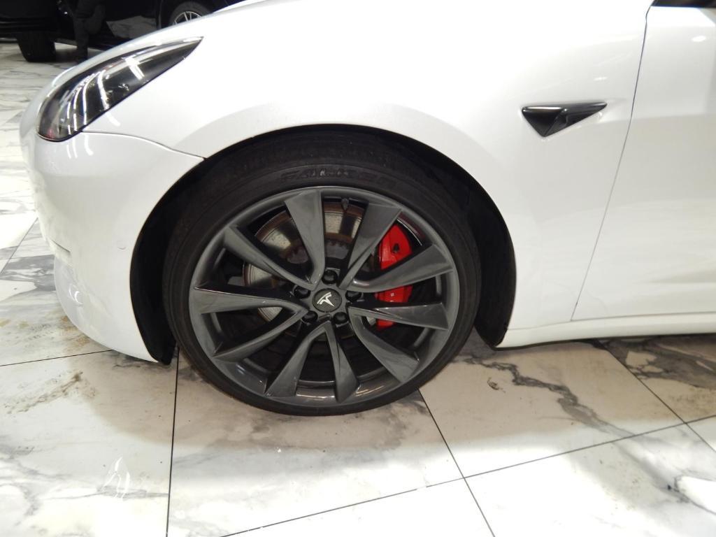 used 2022 Tesla Model 3 car, priced at $27,595