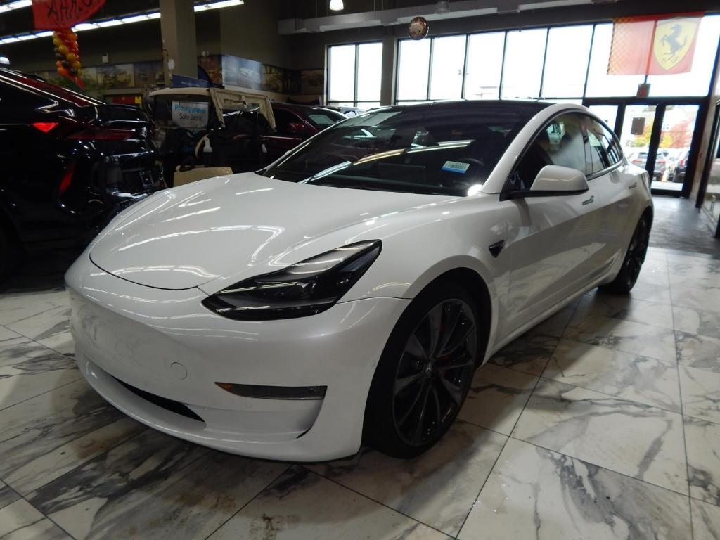 used 2022 Tesla Model 3 car, priced at $27,595