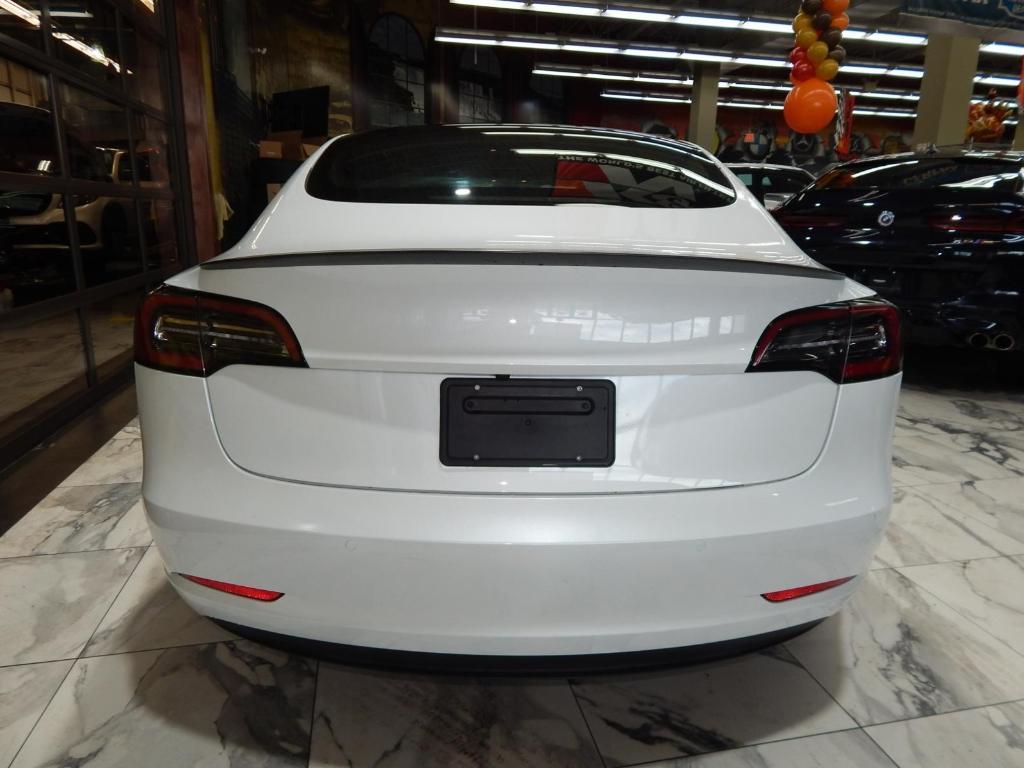 used 2022 Tesla Model 3 car, priced at $27,595
