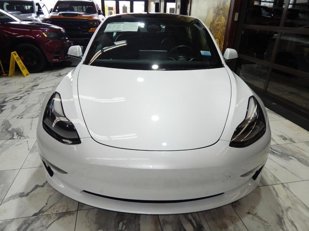 used 2022 Tesla Model 3 car, priced at $27,595