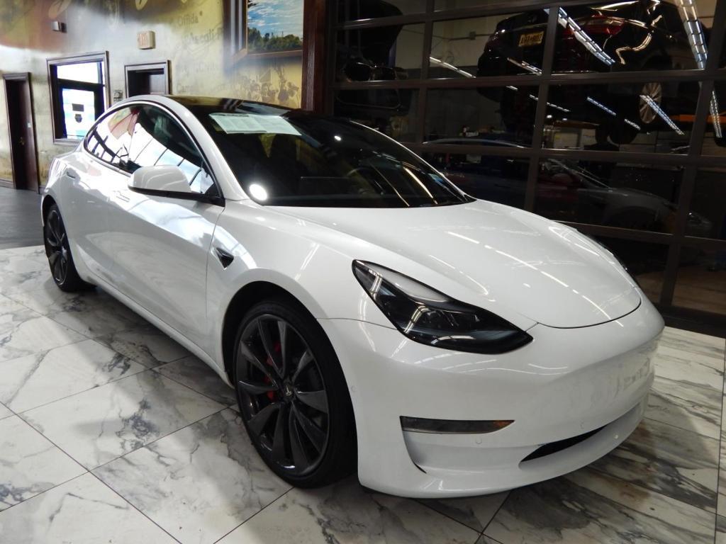 used 2022 Tesla Model 3 car, priced at $27,595