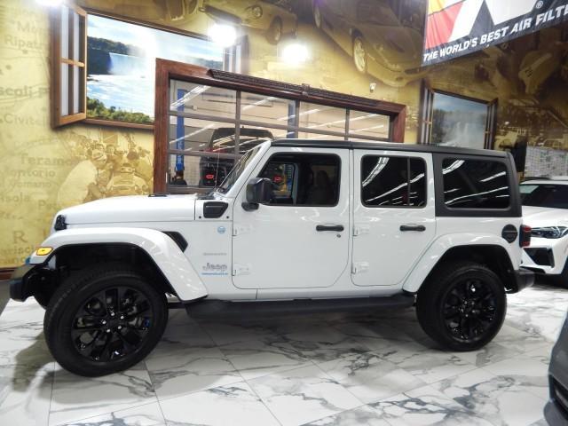 used 2023 Jeep Wrangler 4xe car, priced at $29,821